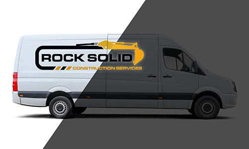 Reflective Decal on a white van advertising for Rock Solid Construction.